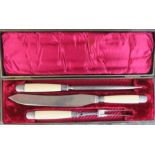A Vulcan Hyde & Sons of Sleaford carving set in the original red silk lined box.