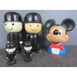 A Mickey Mouse money box, together with Dough Pride flour shakers and salt & pepper.
