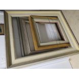 A group of various frames, with deep mouldings, one silver gilt, one with cream linen border.