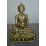 A bronze figure of a Deity. 21cm high