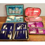 A group of four travelling sewing sets, one by Mappin & Webb, each with bone or mother of pearl