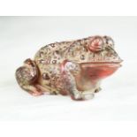A Japanese carved bead, in the form of a toad. 3cm high