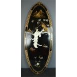 A Chinese black lacquered and mother of pearl plaque, depicting a geisha girl.