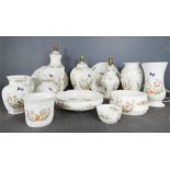 An Aynsley Cottage Garden group, including three lamp bases, jugs, vases, bowls etc.