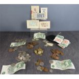 A quantity of coins, various GB, leather purses and a group of embroidered cards.