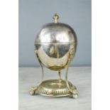 A silver plated Victorian egg warmer / coddler, lacking burner, raised on lion paw feet. 21cm