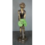 A bronze fountain figure of a pixie with three water lily leaves, 77cm high.