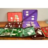 Four late Edwardian sewing sets, each with original boxes and contents.