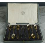 A set of six silver spoons with sugar tongs, 2.90toz.