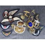 A selection of RAF and RCAF badges, wings, buttons, etc.