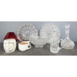 A group of cut glassware to include two decanters, red glass, dishes etc.