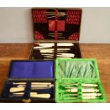 Three Edwardian travelling sewing sets, each boxed and containing bone handled implements, one
