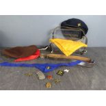 A group of Girl Guides memorabilia, including hat, leather belt, badges etc.