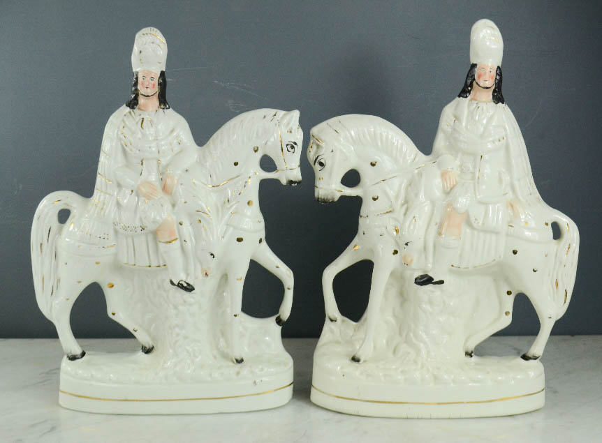 A pair of 19th century Staffordshire figures on horseback.