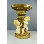 A table centrepiece modelled with cherubs.