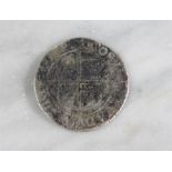 An Elizabethan silver coin.