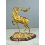 A 19th century gilt bronzed stag.