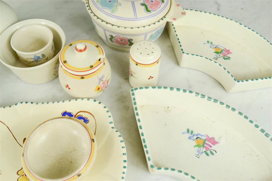 A group of Poole pottery, including four dishes, cruet set, lidded pot etc. - Image 2 of 2