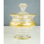 A bohemian gilt glass pedestal bowl and cover, 17cm high.