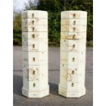 A pair of white lacquer Chinese hexagonal sets of drawers.
