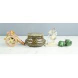 A group of soapstone and agate to include carvings of hippo, stork, cannon and a trinket box.