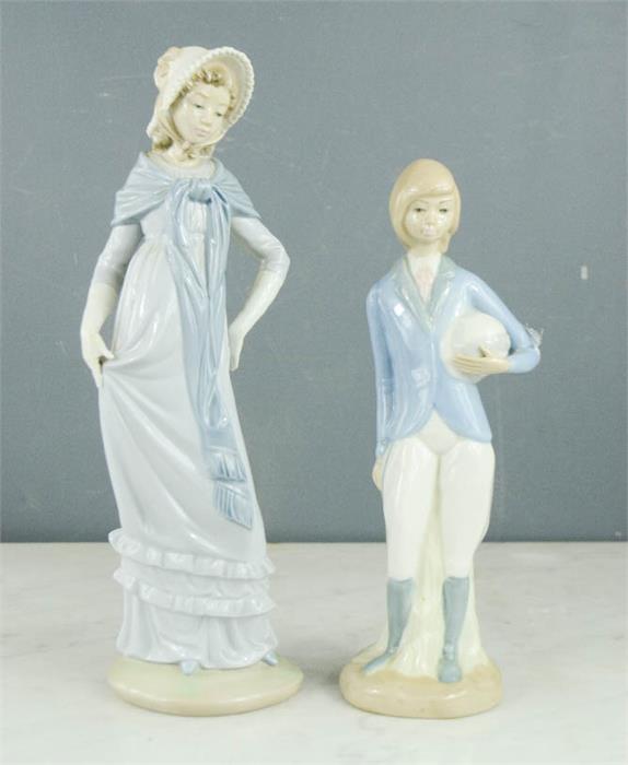 A Nao Lladro figurine and a Cascades figurine.