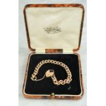 A 9ct gold bracelet with heart form clasp, safety chain, 11.4g.