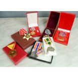 A selection of world military medals to include Russian examples.