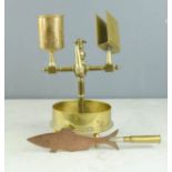 A brass smoking stand, trench art style, together with a trench art fish shaped letter opener with