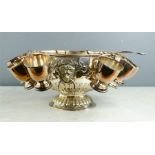 A silver plated punch bowl, with original cups and ladle.