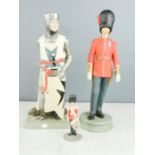 Two ceramic figures; one night Guardsman, the other Irish guards.