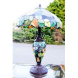 A Tiffany style table lamp Height is 61cm, the other is 41cm diameter.