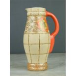 A Charlotte Rhead jug, Bursleyware, no 325 to base, 24cm high.