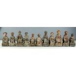 Eleven Chinese carved figures, some with residual paintwork.