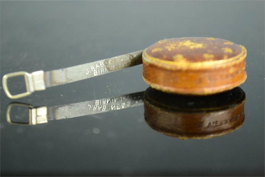 An original Girl Guides pocket tape measure, with tooled gilt Guiding trefoil motifs. - Image 2 of 2