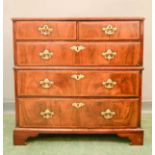 An 18th century walnut chest of drawers, with two short over three long graduated drawers.