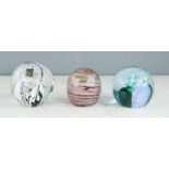 Three glass paperweights including Langham, Wavecrest MN086.