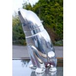 A silver plated cocktail shaker in the form of a polar bear.