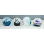 Four glass paperweights: Caithness N9736, M85741, M74503, Weathervane 1543.