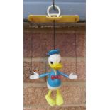 A 1970 Disney Donald Duck marionette.