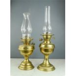 Two brass parafin lamps.