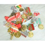 A large selection of World military medals to include Polish and Russian examples.