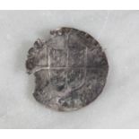 An Elizabethan coin.