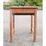 A pine school desk.