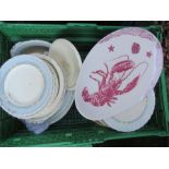 A group of ceramics including lobster plate.