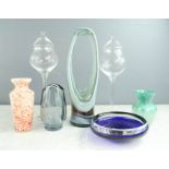 A group of glassware including Swedish Art glass candle holders, Murano glass ornament, vases etc.
