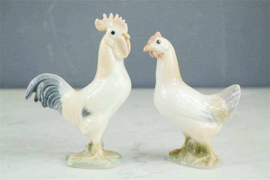Royal Copenhagen Denmark porcelain cockerel and B&G hen, nos. 2192, 2193.