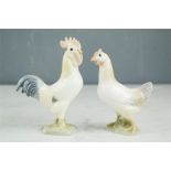 Royal Copenhagen Denmark porcelain cockerel and B&G hen, nos. 2192, 2193.