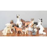A group of ceramics animals incluidng Stoat, Cart horse, boxer, bulldog etc.
