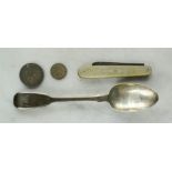 A silver and mother of pearl pen knife, silver spoon and coins.